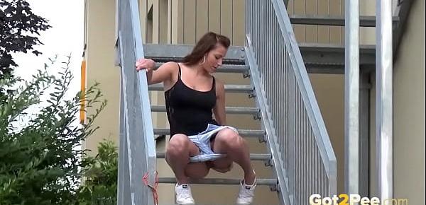 Fit Brunette Pees Down The Stairs